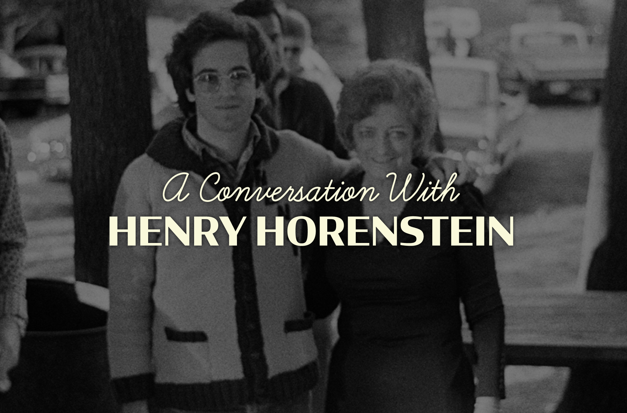 A black and white photograph of a young Henry Horenstein with his arm across the shoulders of Mother Maybelle Carter.