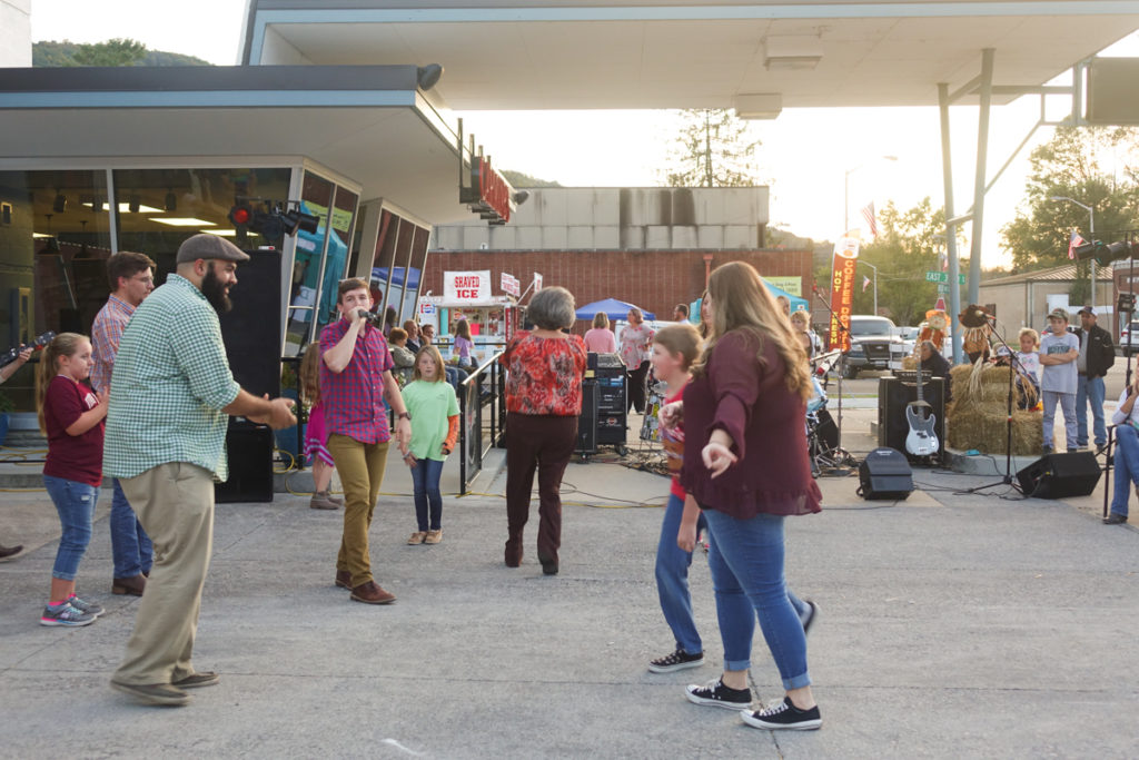 Several dancers participate in a community square dance in Big Stone Gap