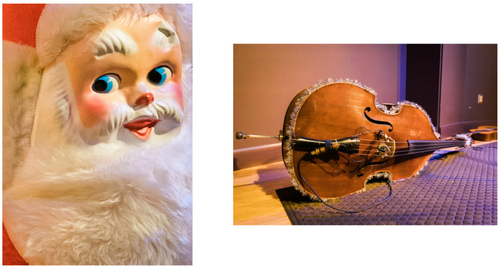 Two festive props from December's Farm and Fun Time: a vintage Santa and a garland bedecked bass.