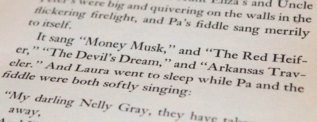 Detail of text describing Laura hearing her Pa play "The Devil's Dream" and other tunes on the fiddle.
