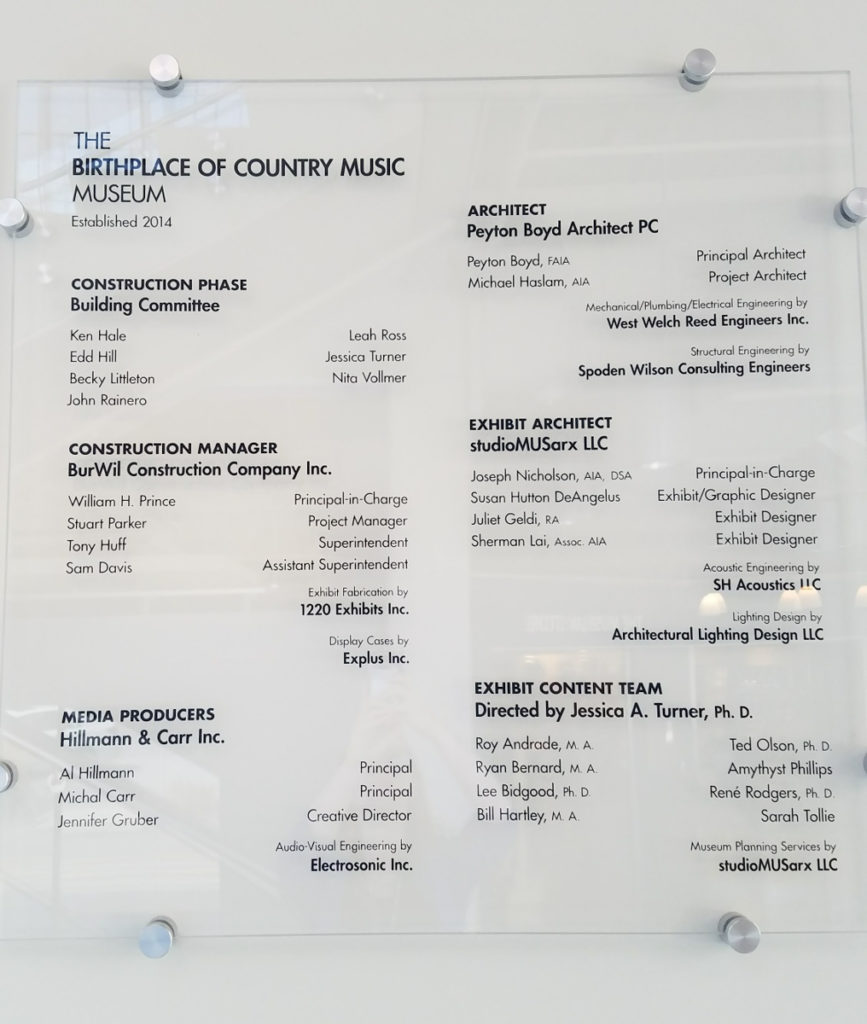 The museum signage listing all of the team members in the museum construction.