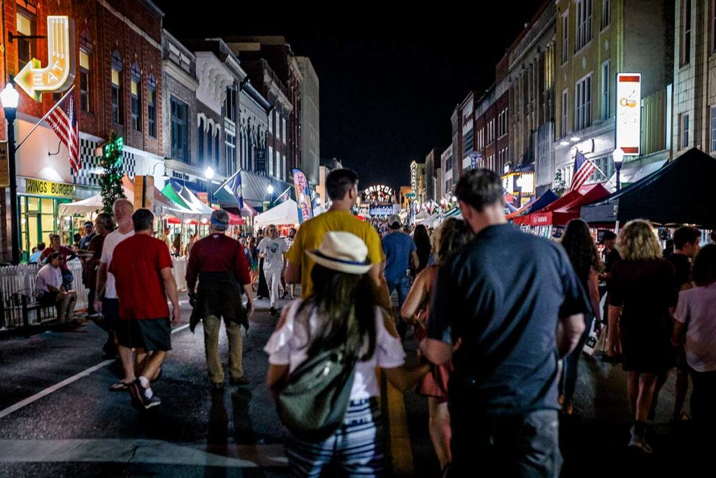 Photo of crowded State Street at night.