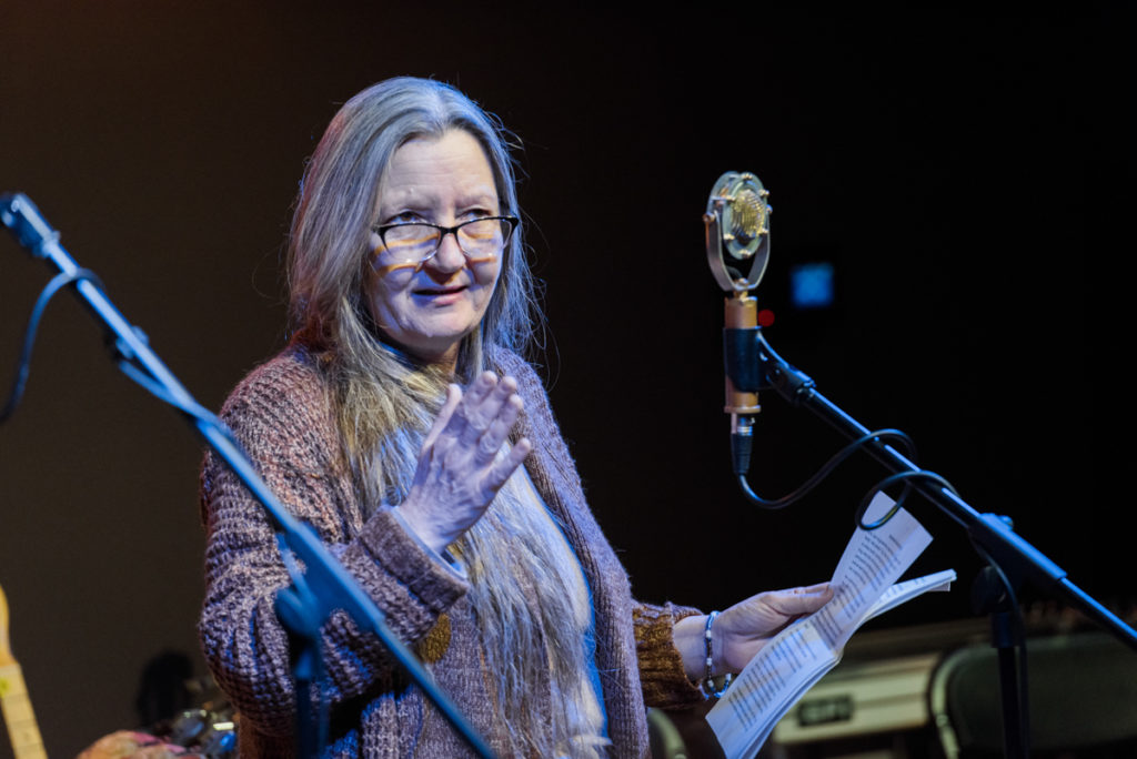 Denise Smith tells the audience all about her family history and dandelion wine.