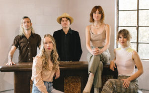 Photo of Molly and her band.