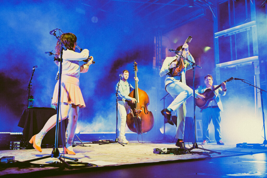 Photo of the band Nickel Creek performing on the State Street Stage at Bristol Rhythm & Roots Reunion 2023.
