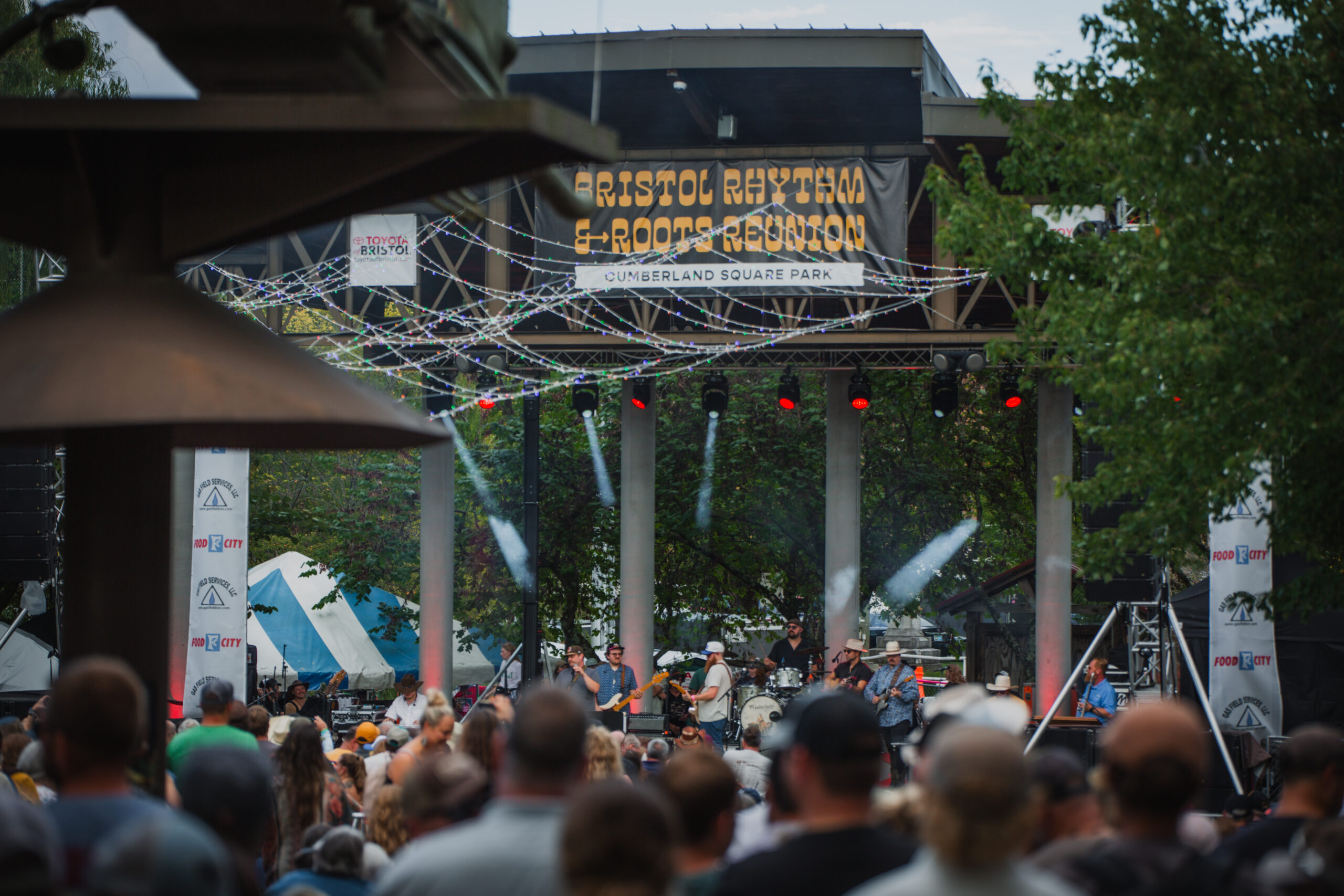 A photo of a crowd gathered at the Cumberland Square Park stage at Bristol Rhythm & Roots Reunion.