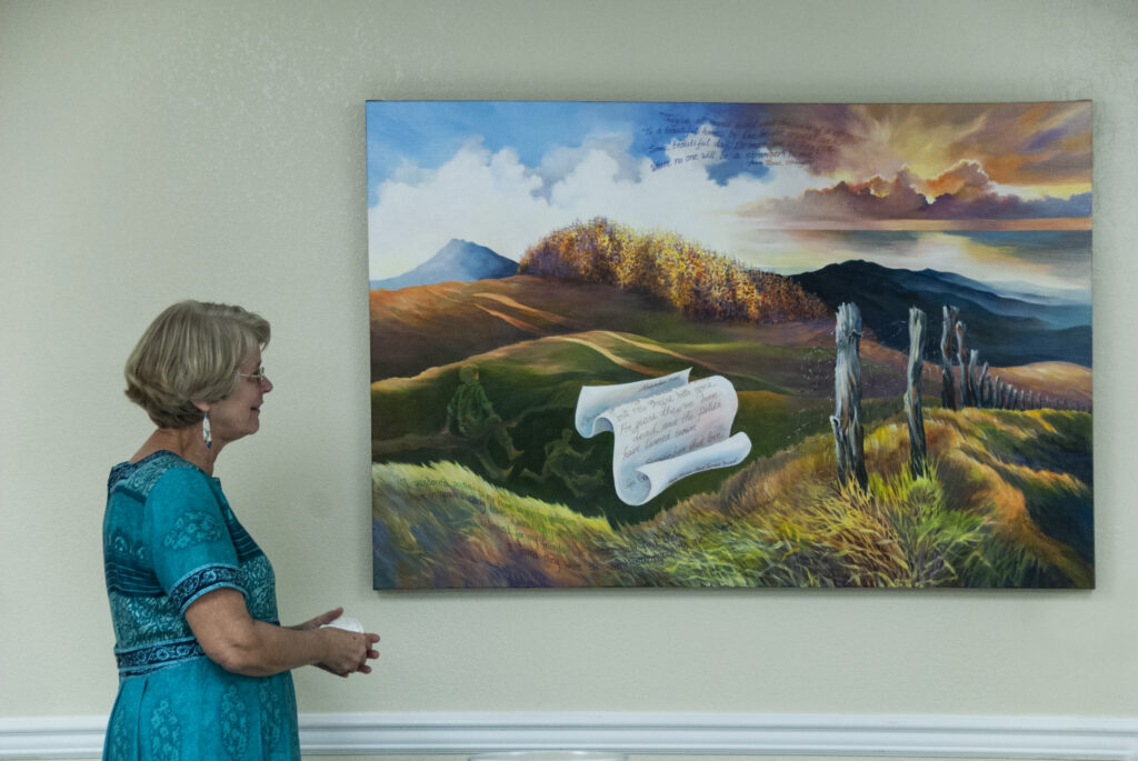 Ellen Elmes with her painting.